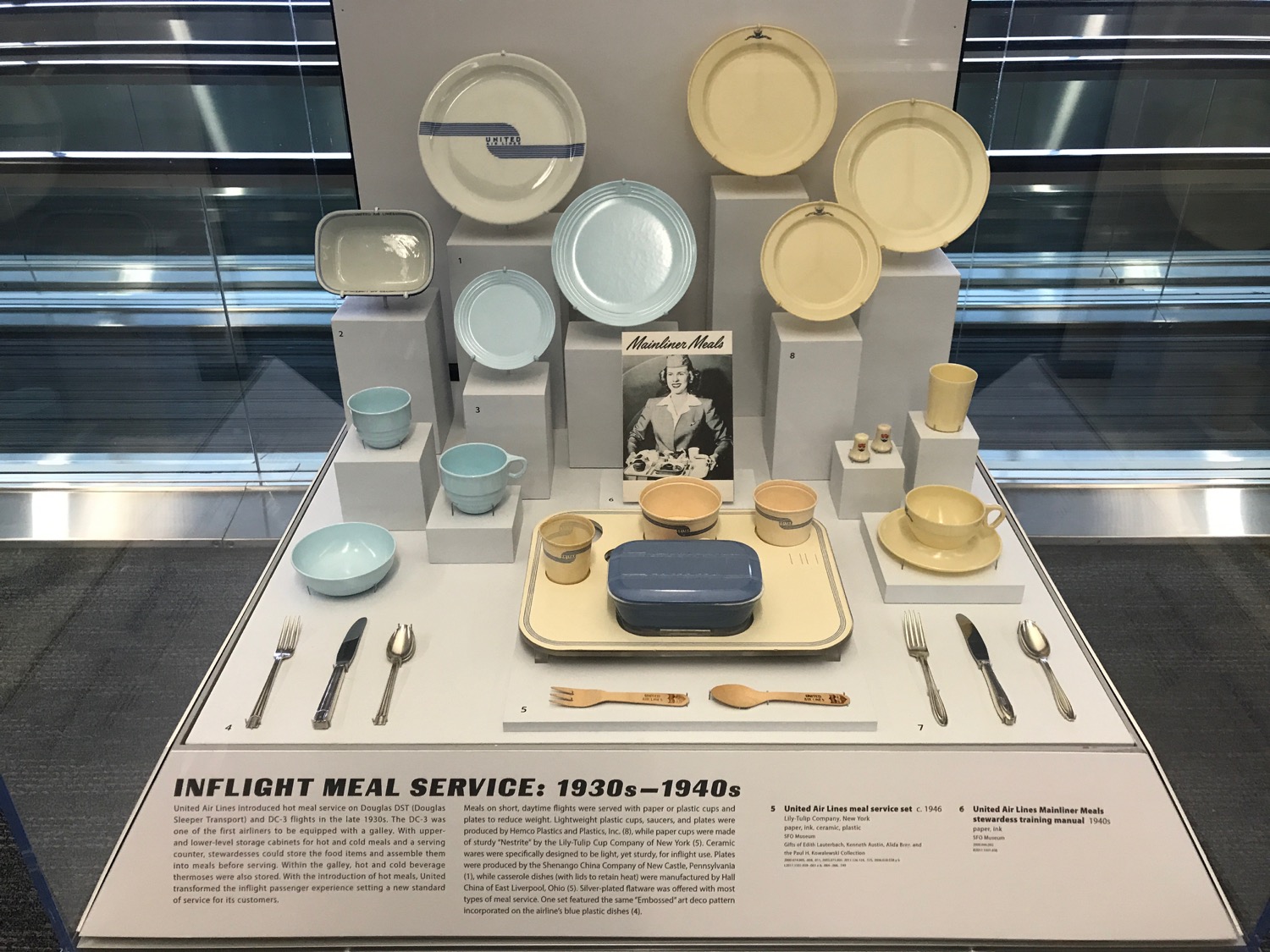 a display of dishes and utensils
