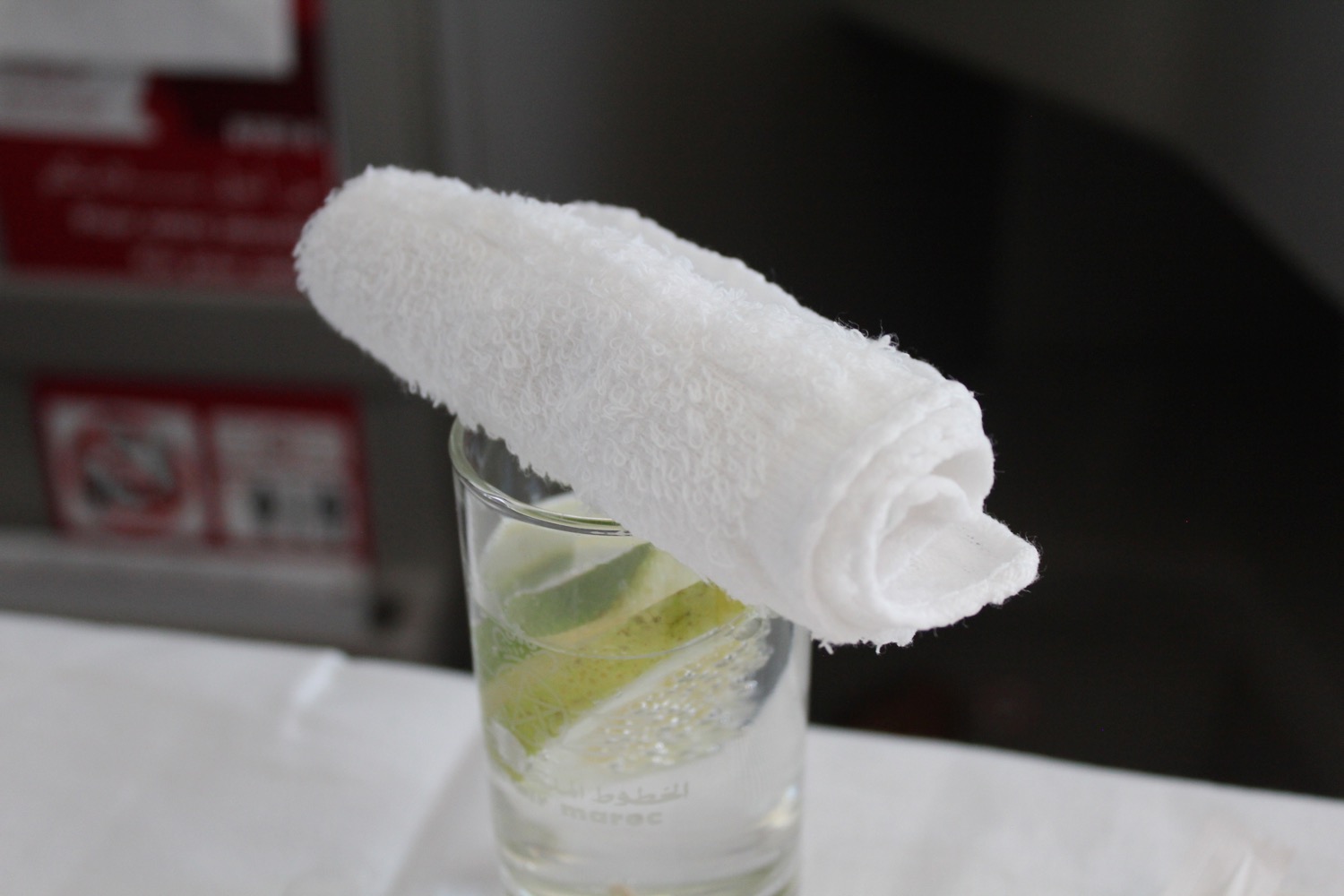 a towel on top of a glass of water