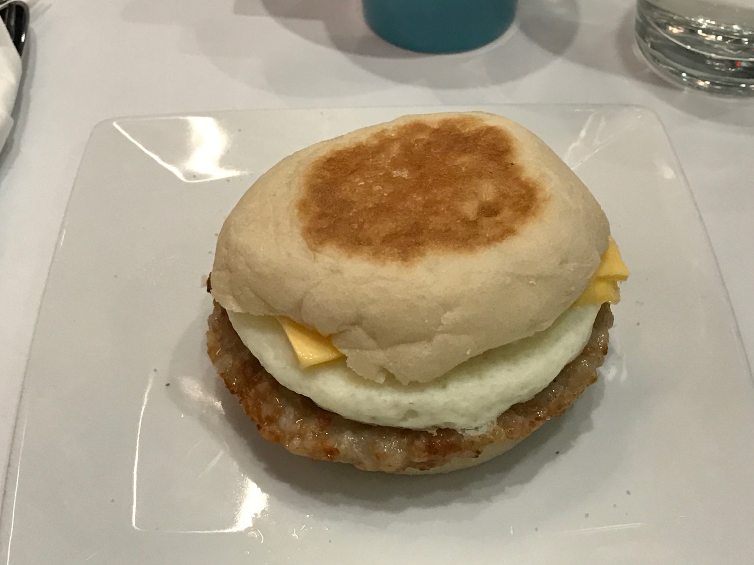a breakfast sandwich on a plate