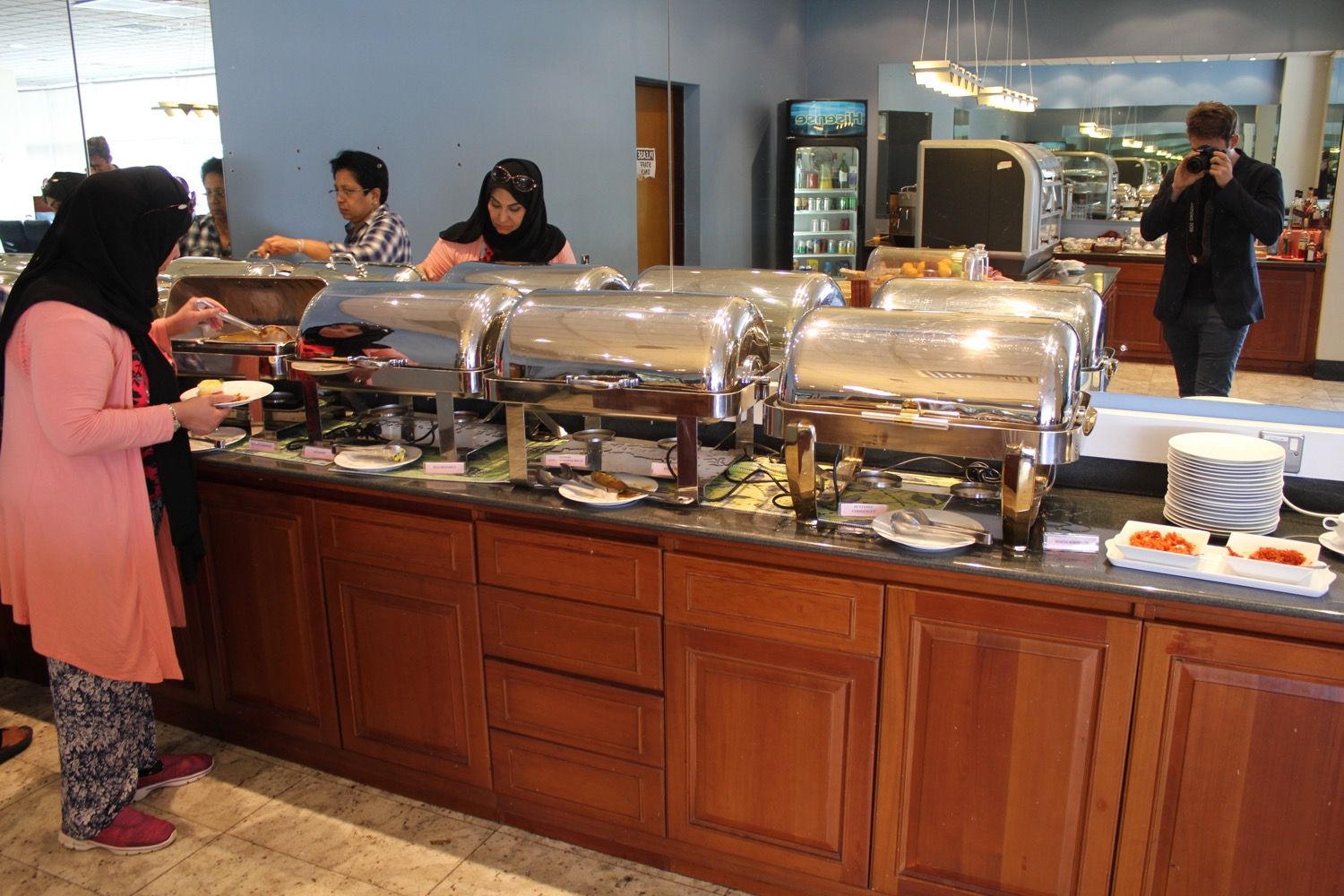 a group of people at a buffet