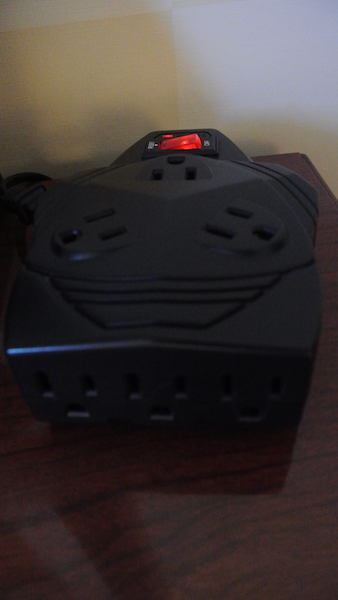 Terrible photo but there are eight outlets on this one power strip (two are hidden).
