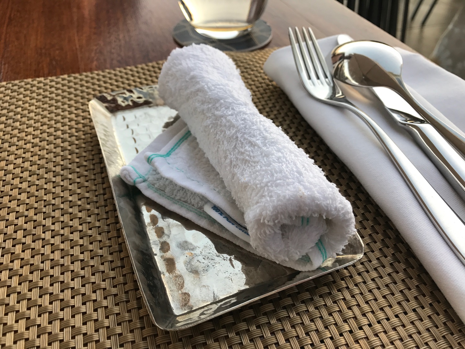 a napkin and fork on a plate