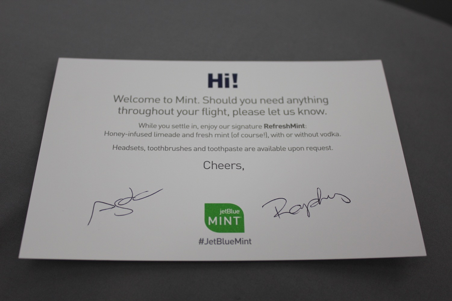 a card with a signature on it