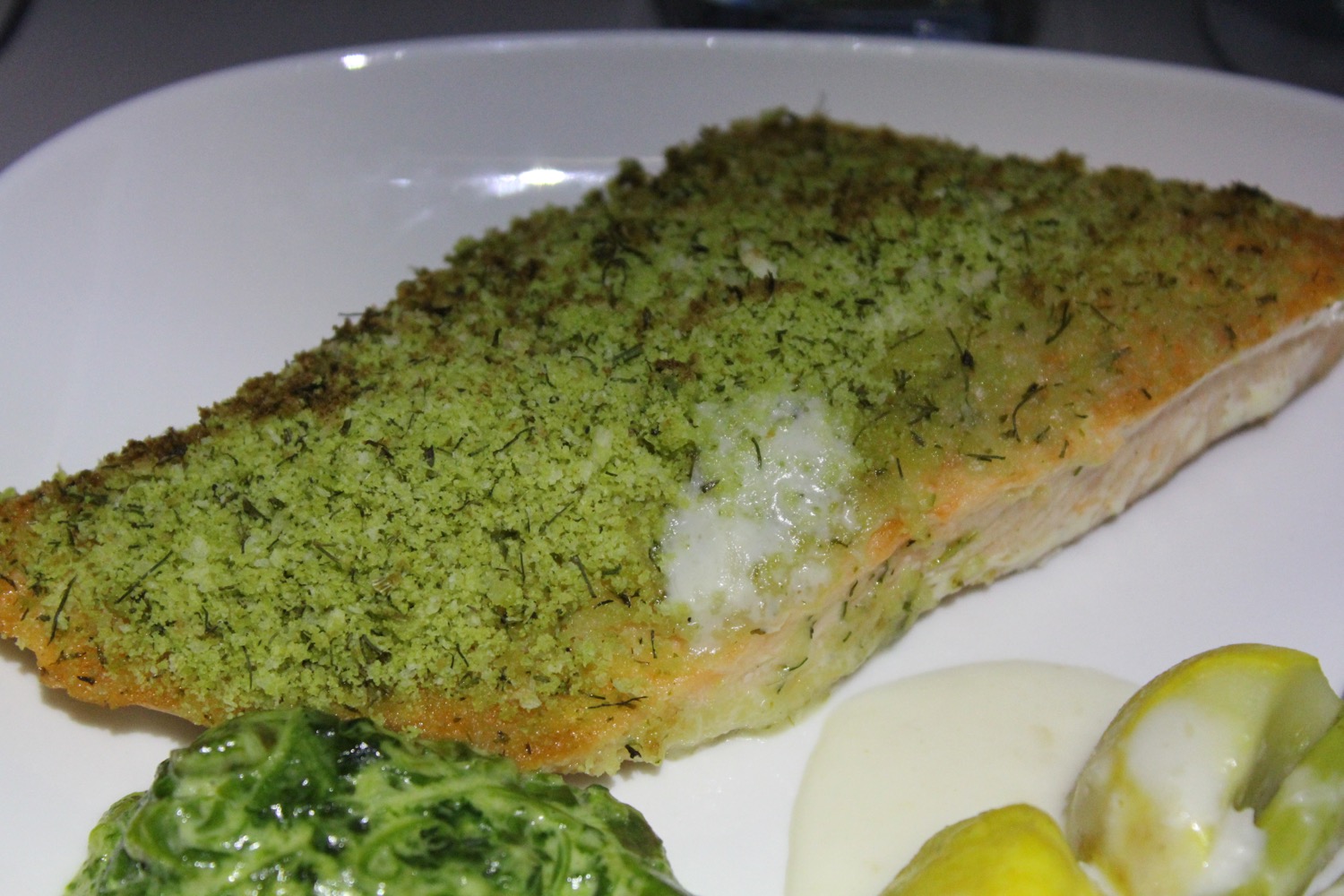 a plate of food with a green crust