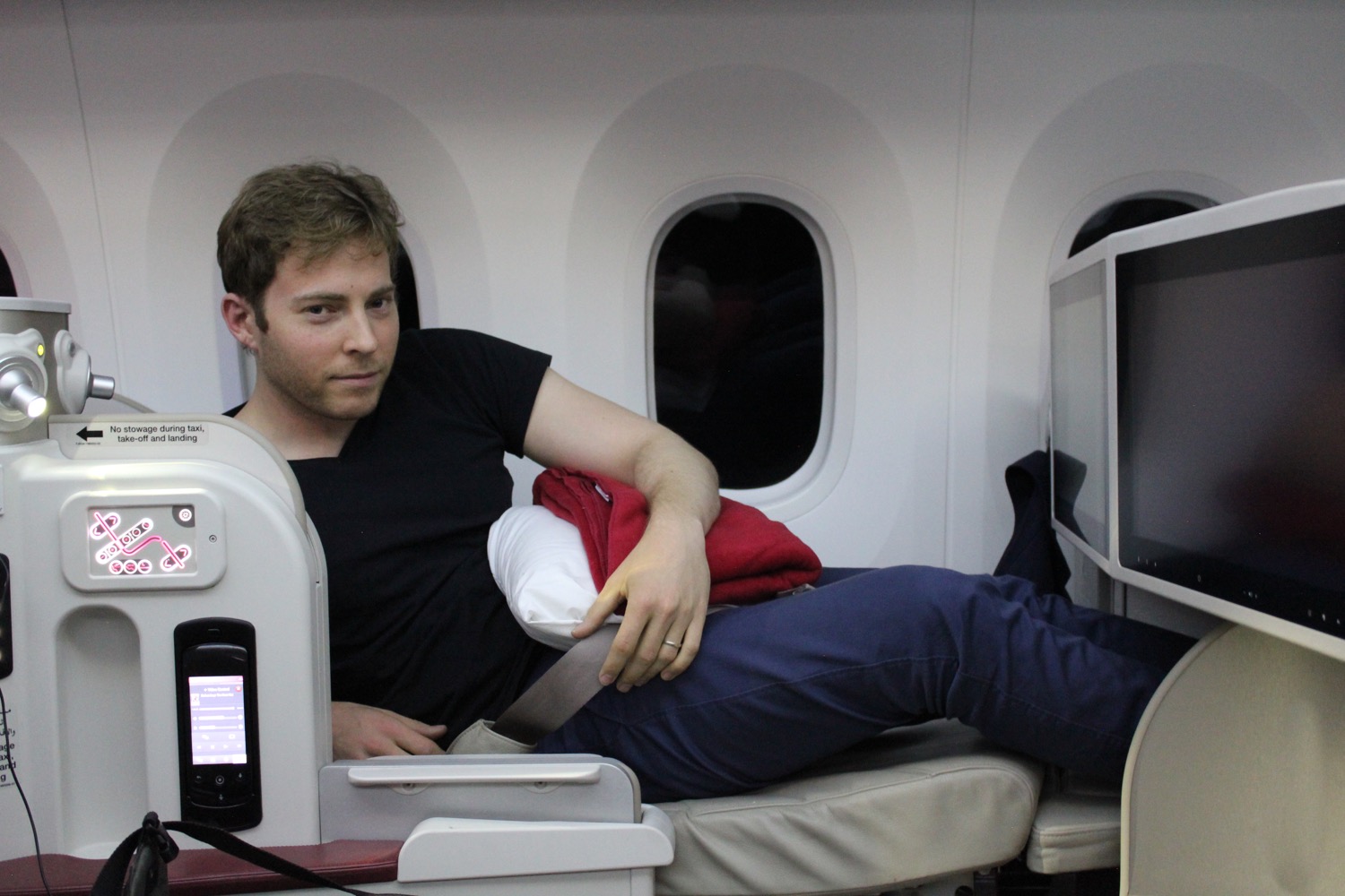 a man sitting on a plane
