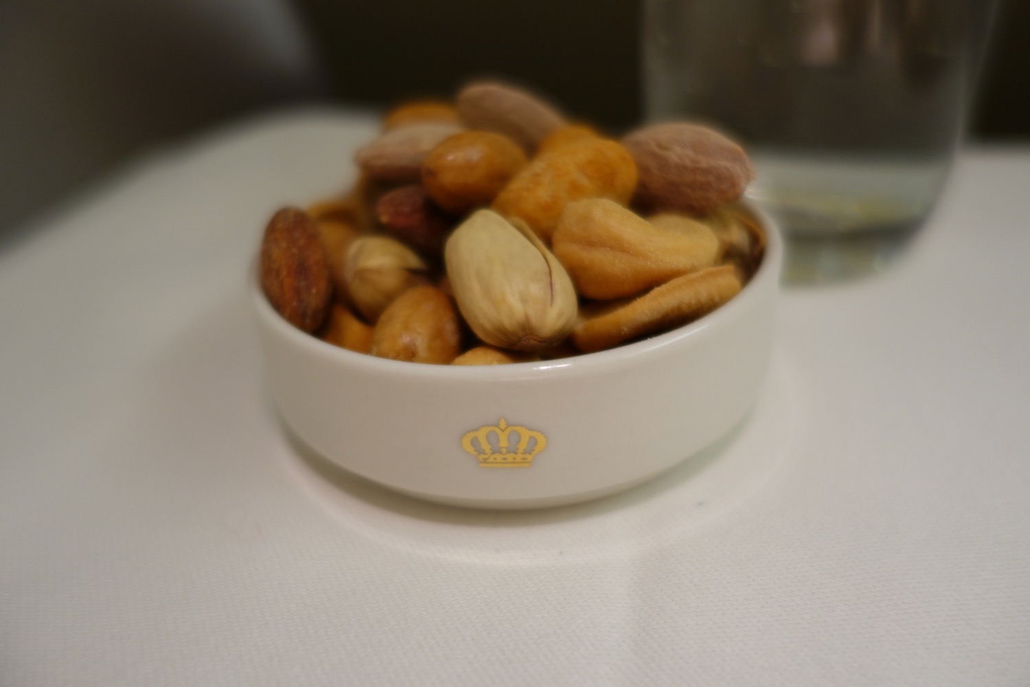 a bowl of nuts on a table