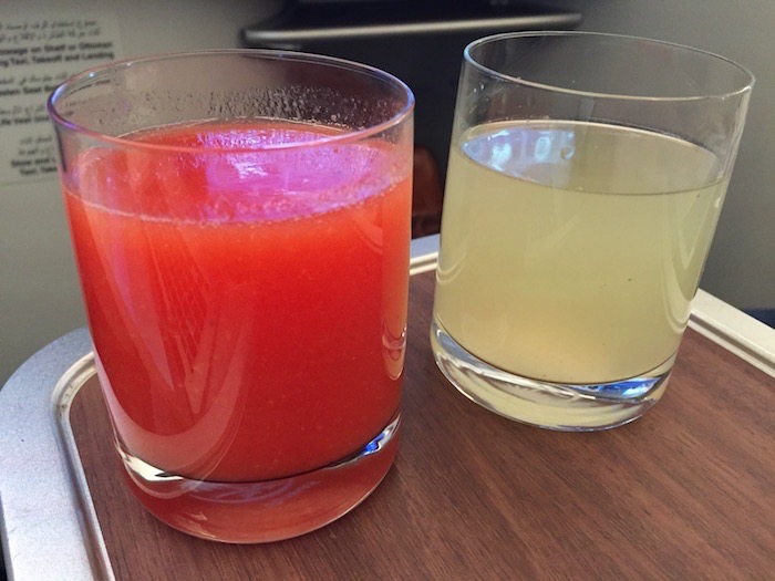 two glasses of juice on a table