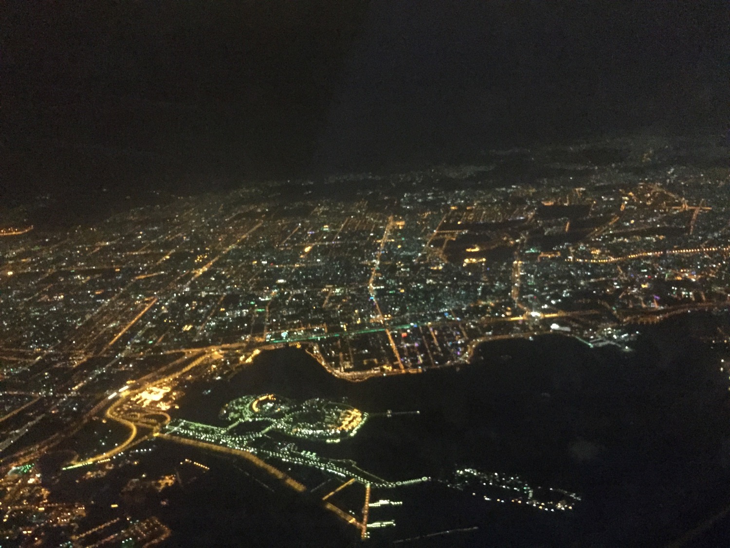 an aerial view of a city at night
