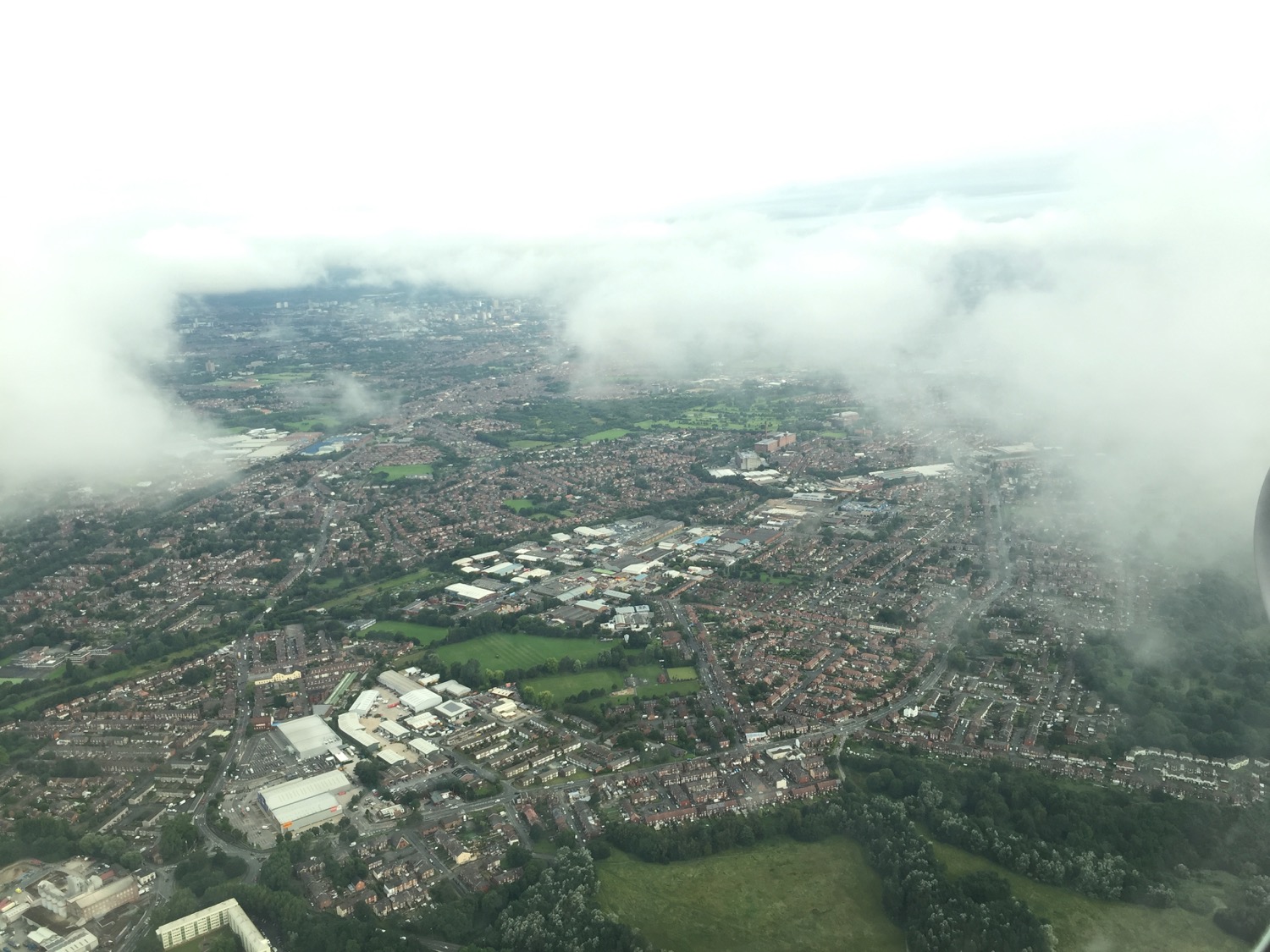 Aerial view of city and clouds