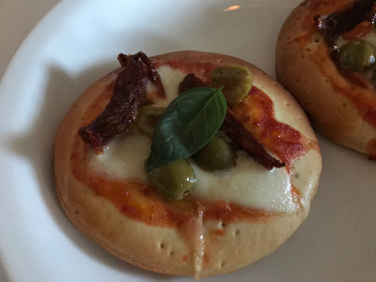 a small pizza on a plate