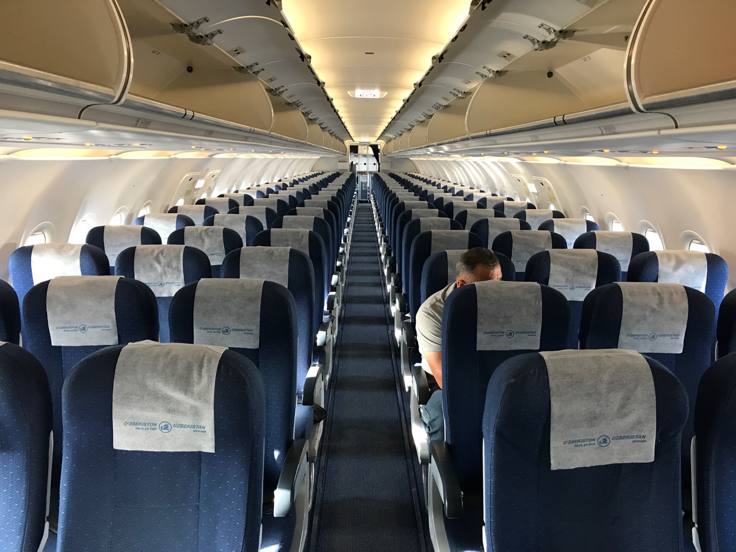 a man sitting in an airplane