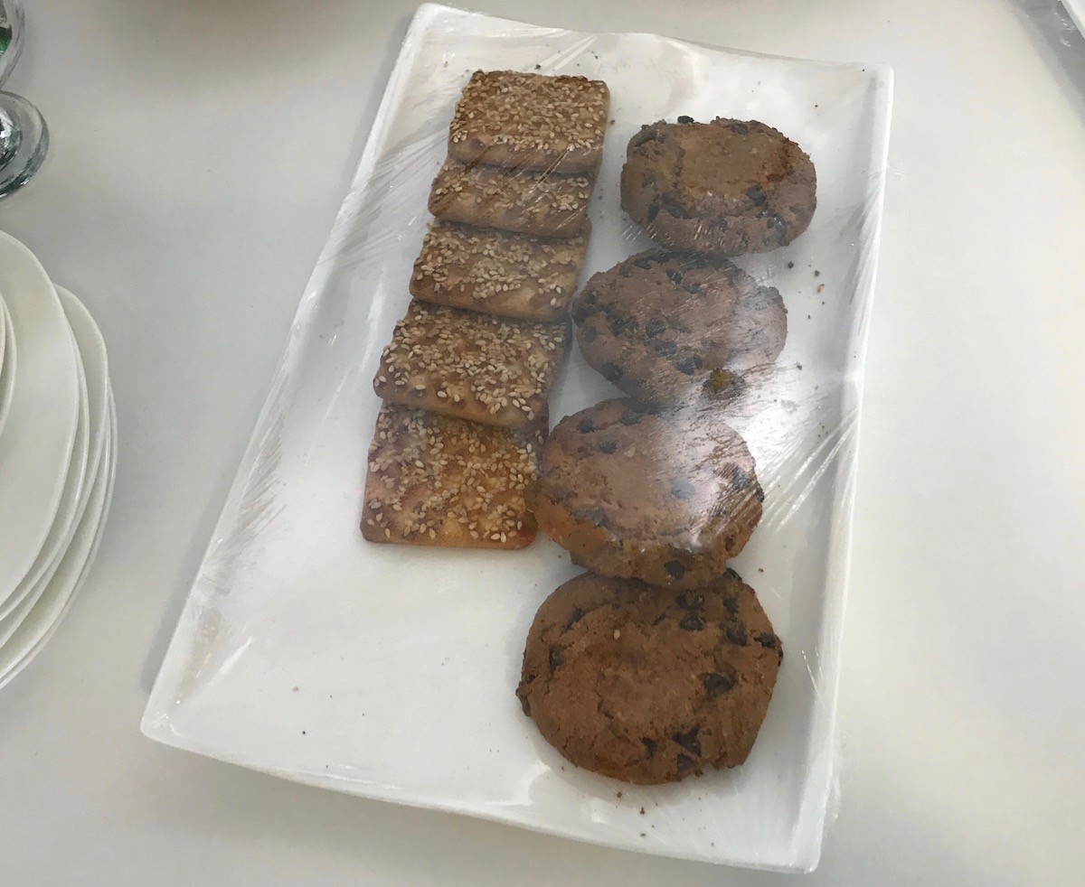 a plate of cookies wrapped in plastic