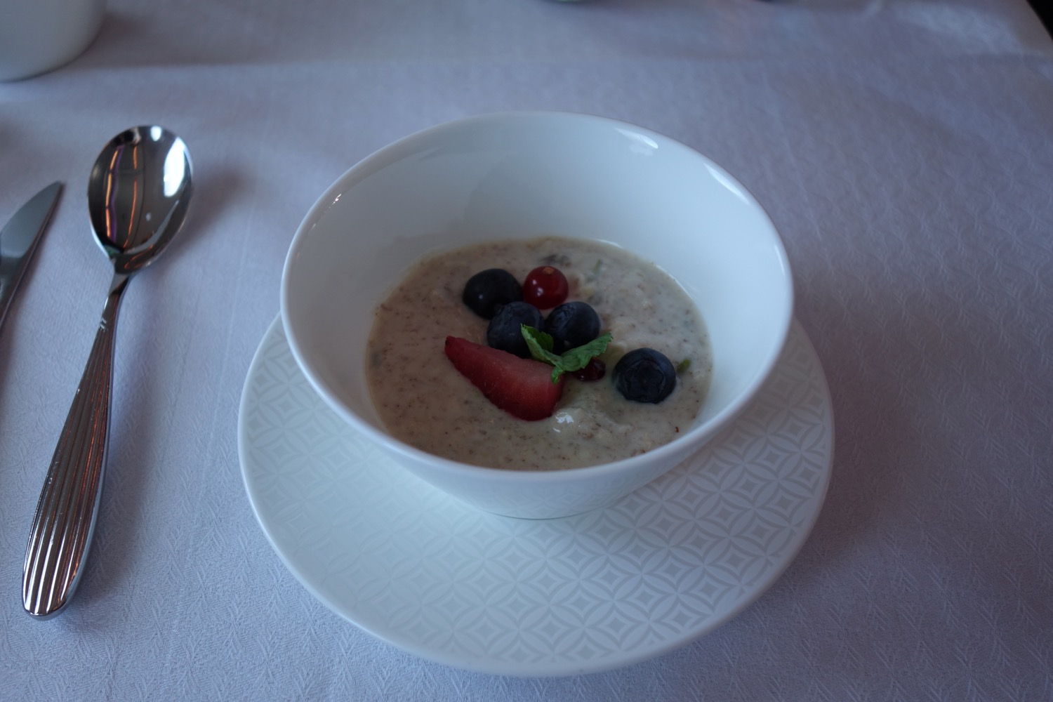a bowl of oatmeal with berries