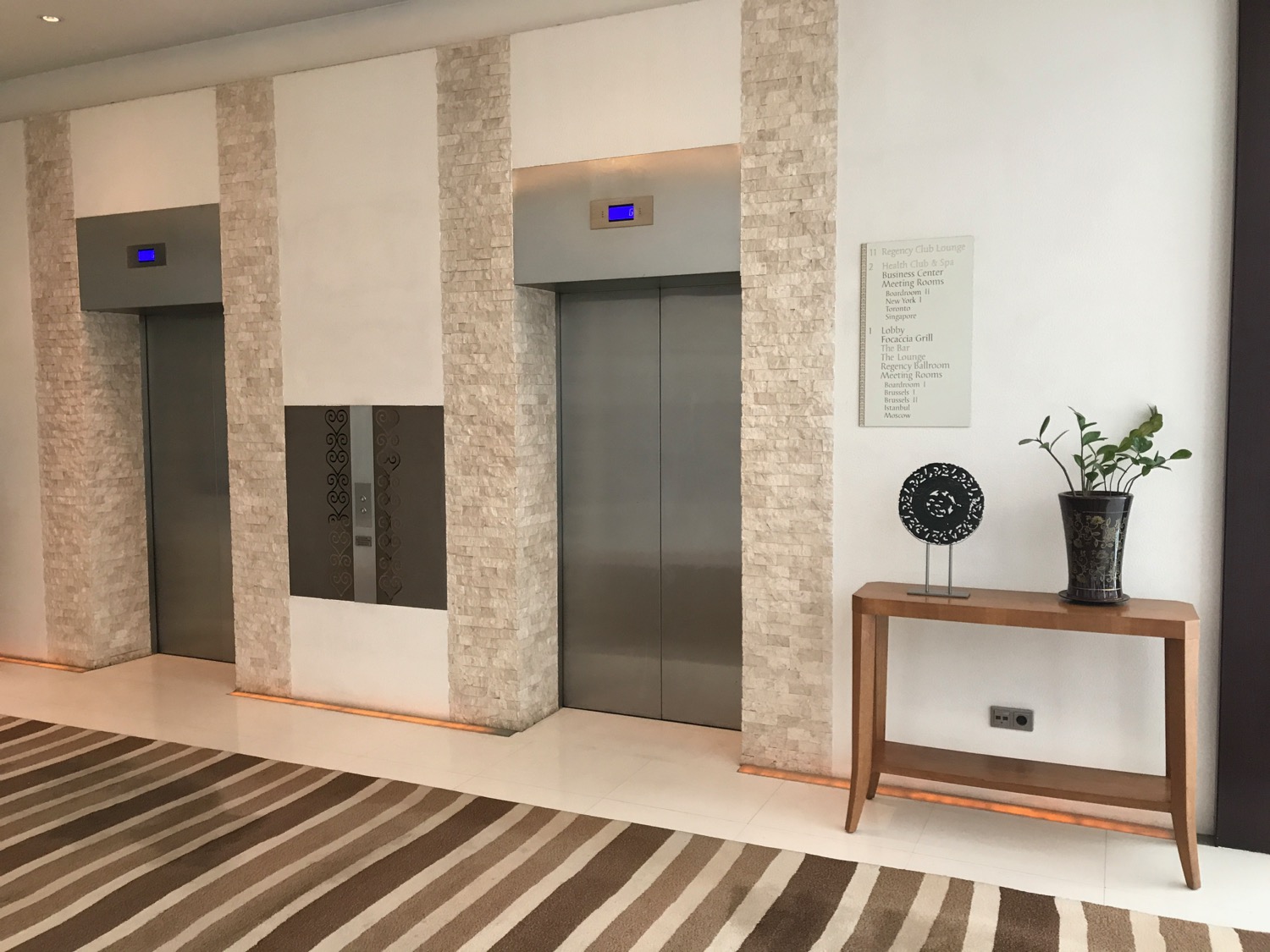 a elevator doors in a room