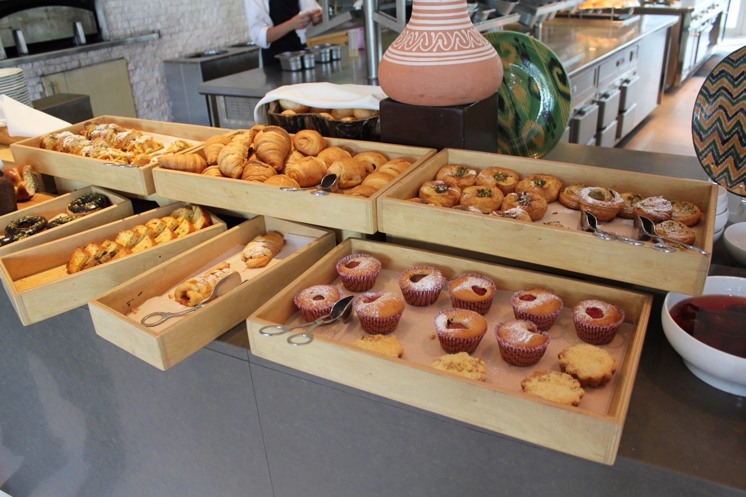 a trays of pastries and pastries in a kitchen
