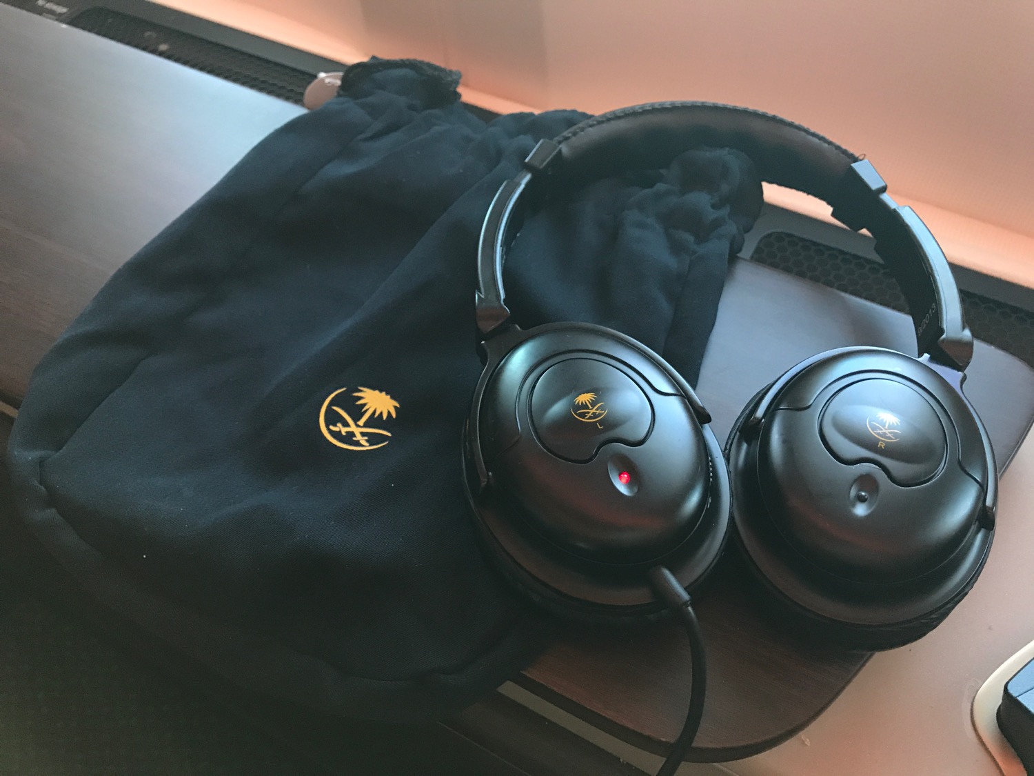 a pair of headphones on a black bag