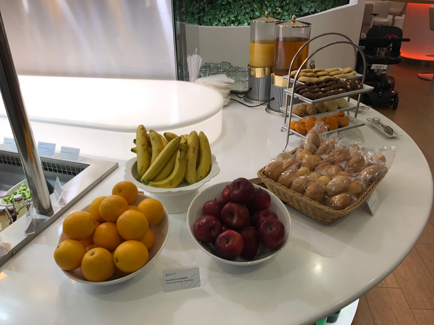 a table with fruit and bread on it
