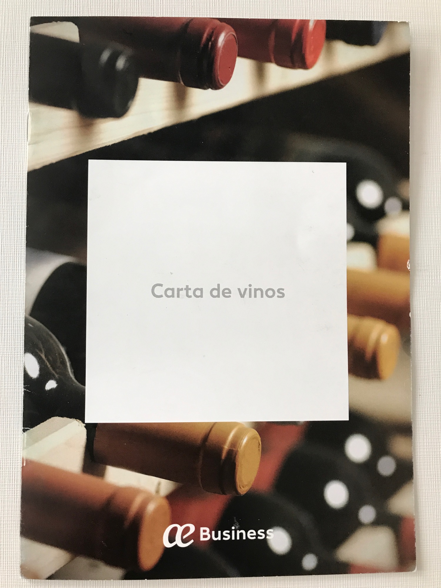 a white square on a wine rack