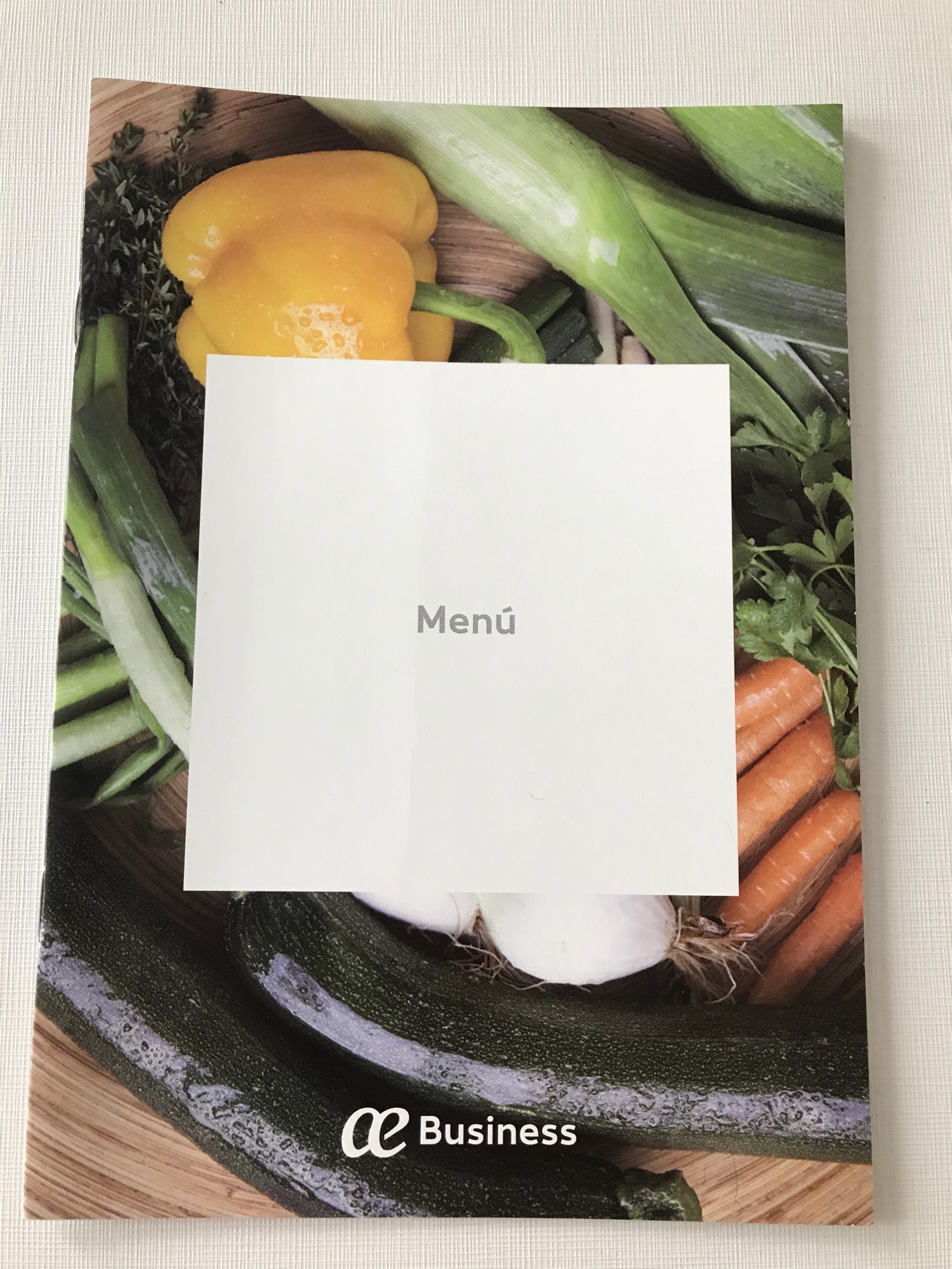 a menu with vegetables on it