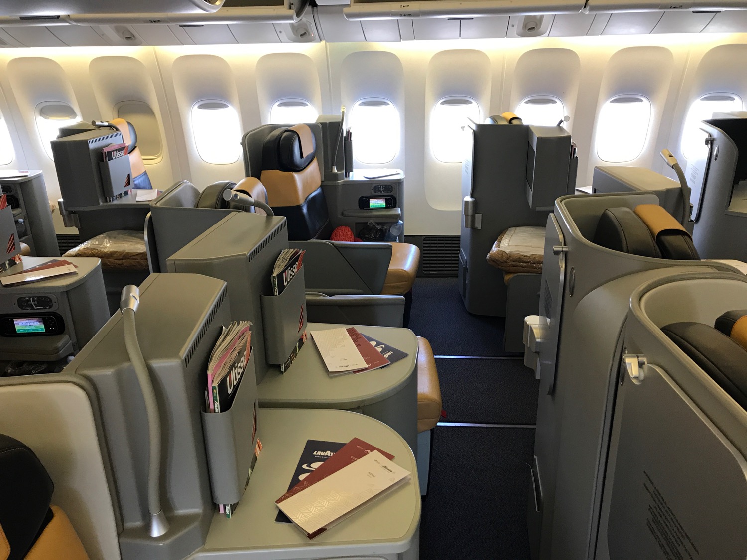 a plane with seats and tables