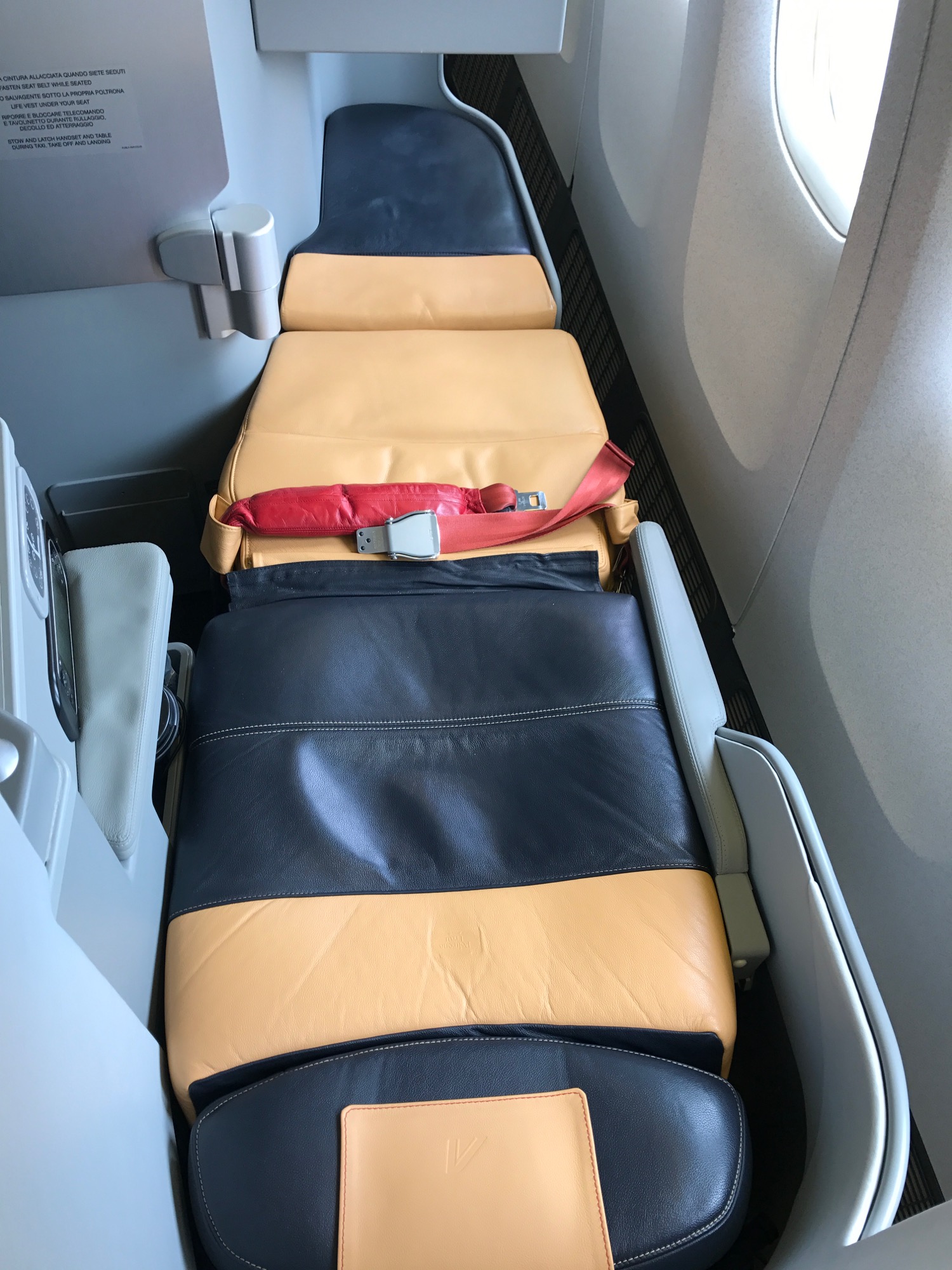 a seat belts on a plane