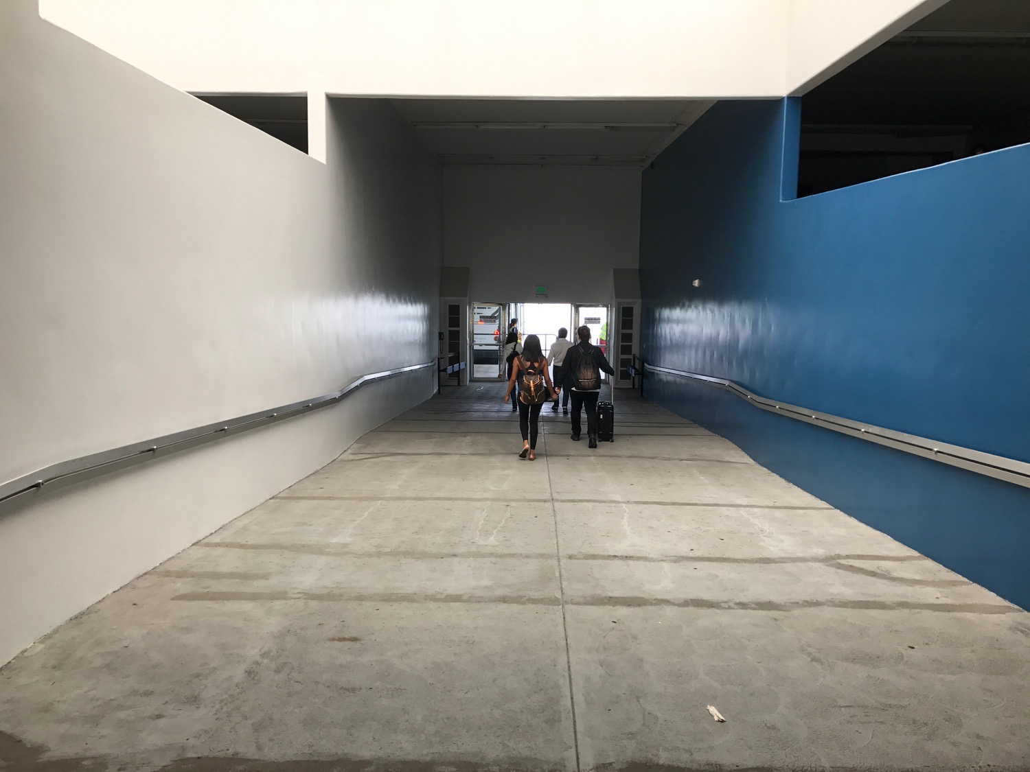people walking in a building