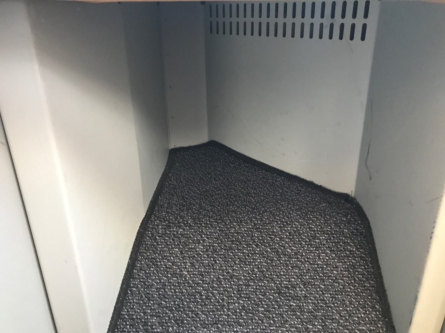 a carpet in a corner