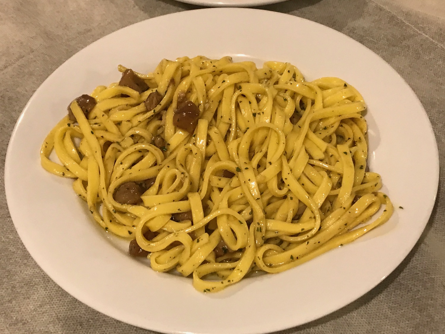 a plate of noodles on a table