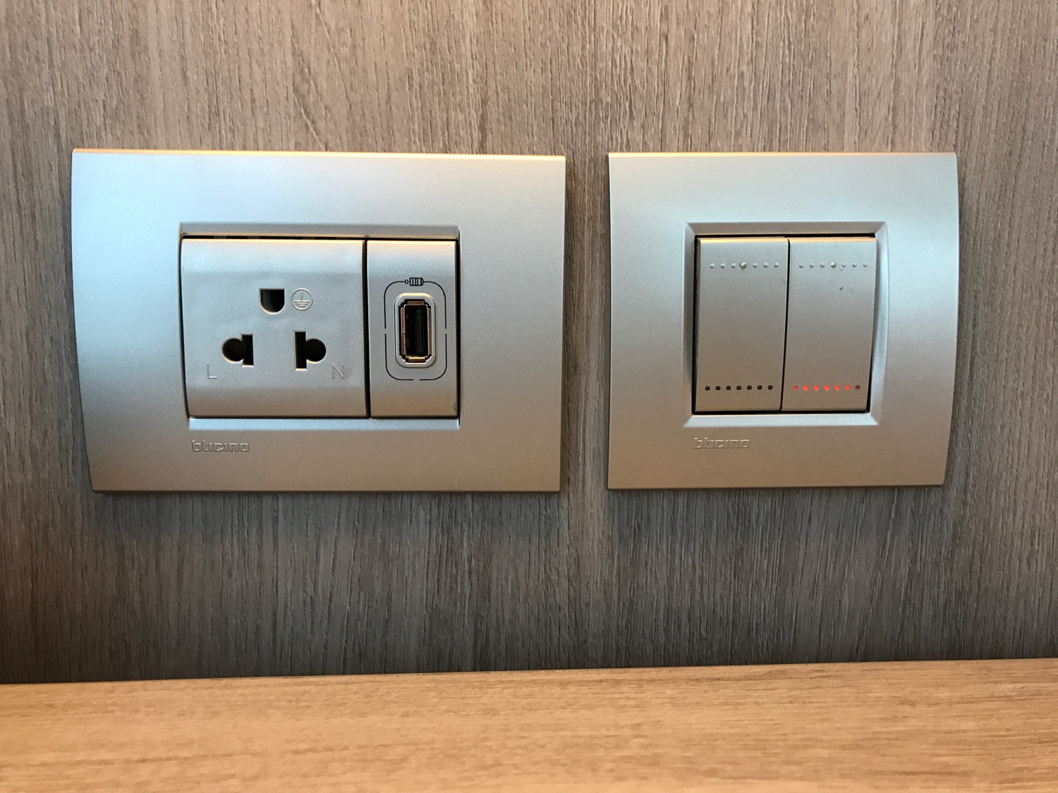 a wall outlet with a usb port and a usb port
