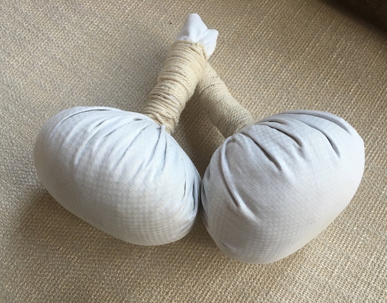 Herbal pouches used in the Yue Hu massage