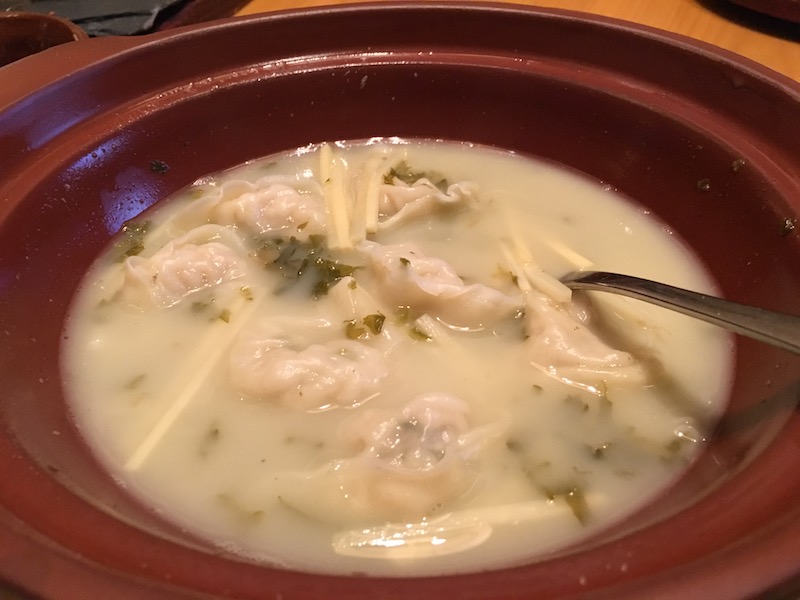 A shared fish soup dumpling pot