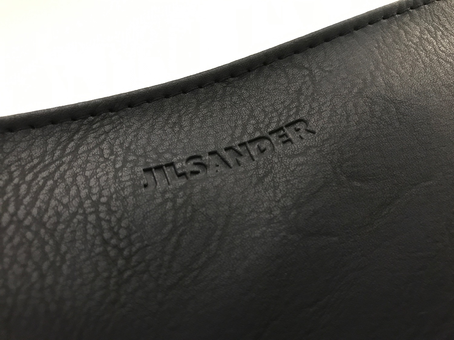 a close up of a leather cover