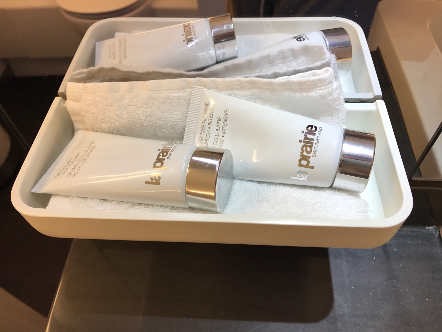a white container with white containers and white towels