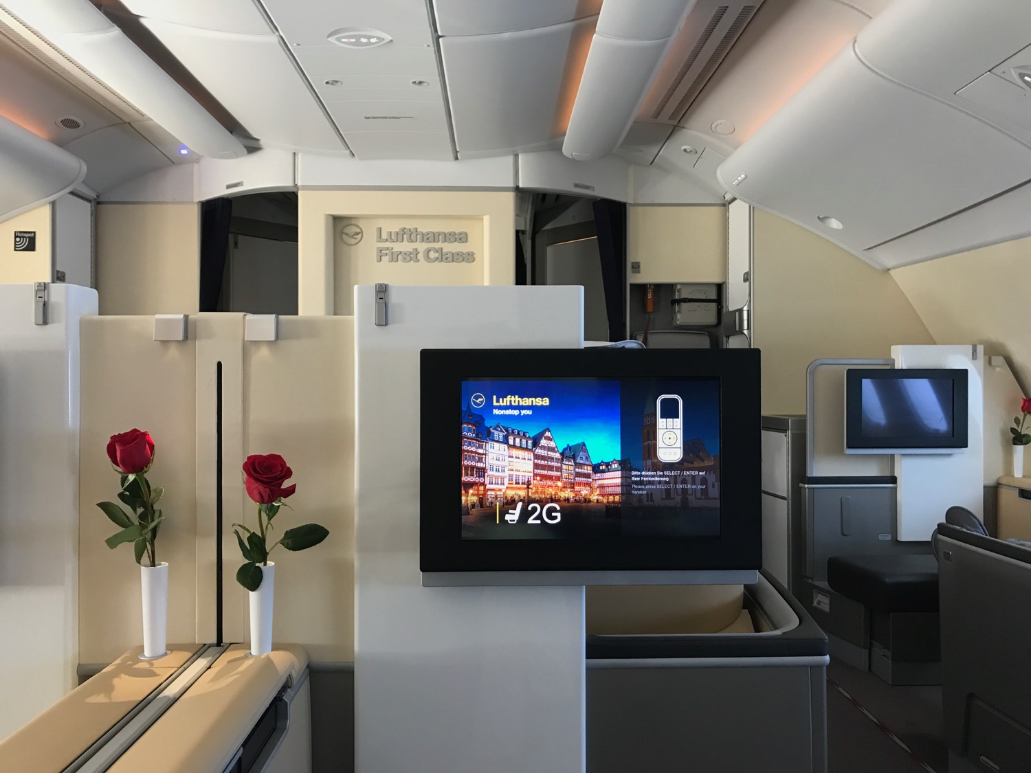 a tv on a stand in an airplane