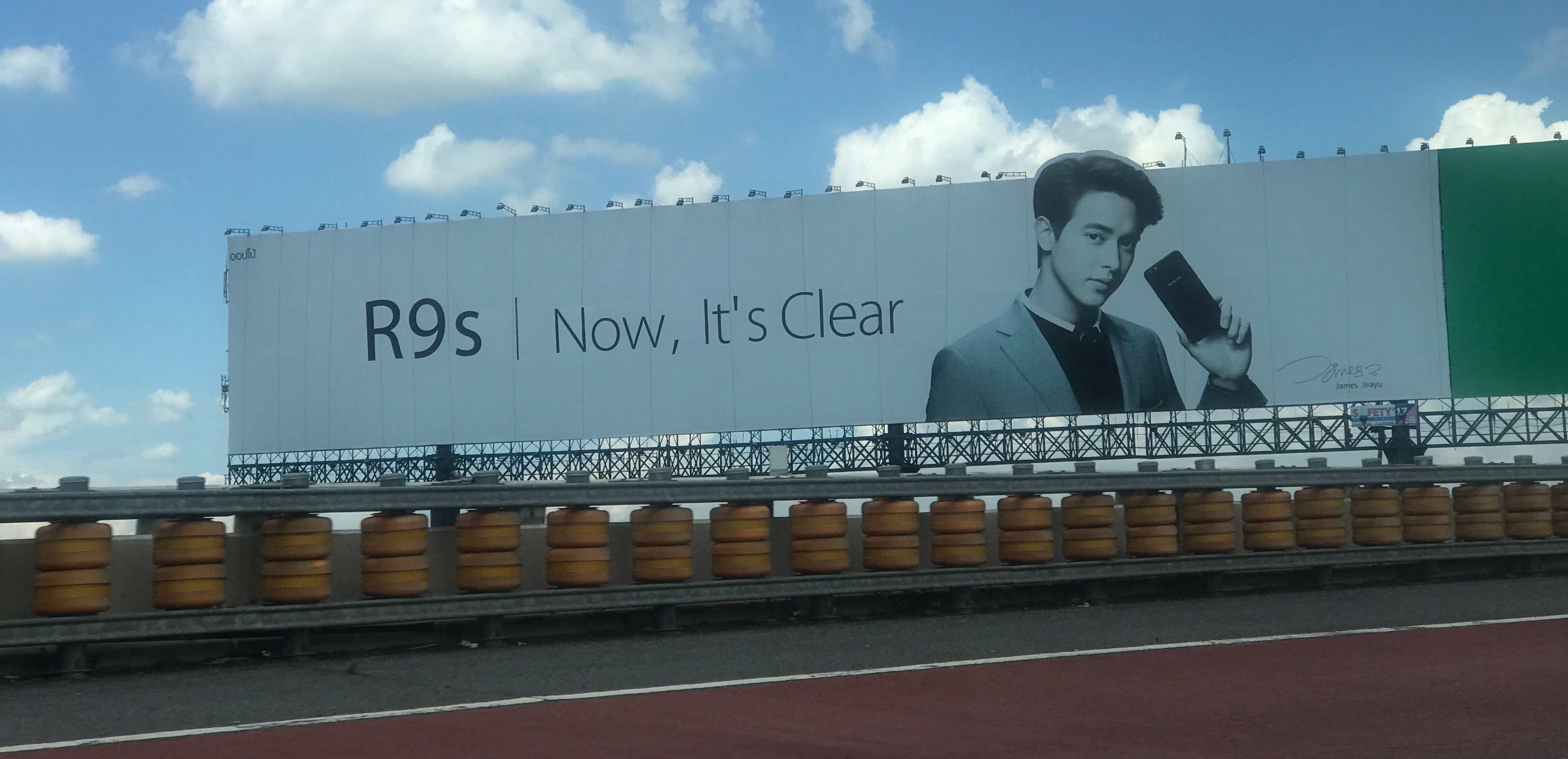 a large billboard with a man on it
