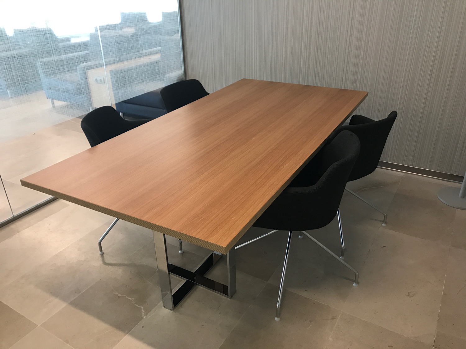 a table with chairs in a room