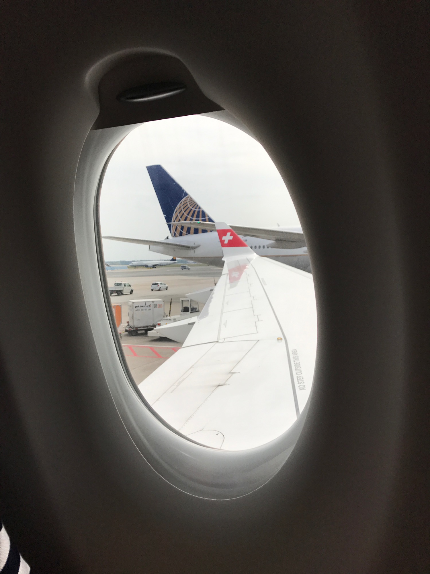 an airplane wing with a logo on it