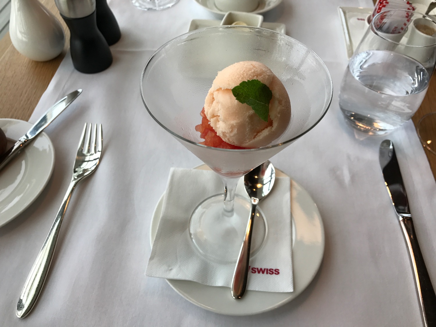 a glass with ice cream in it