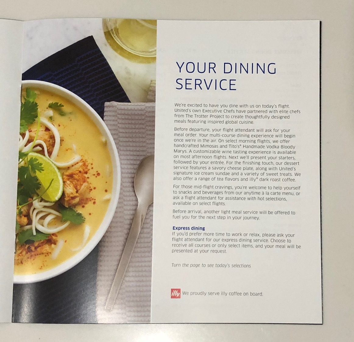 a brochure with a bowl of soup and a spoon