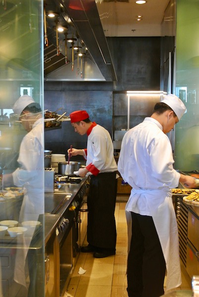 Chefs working on noodles and omelets to order