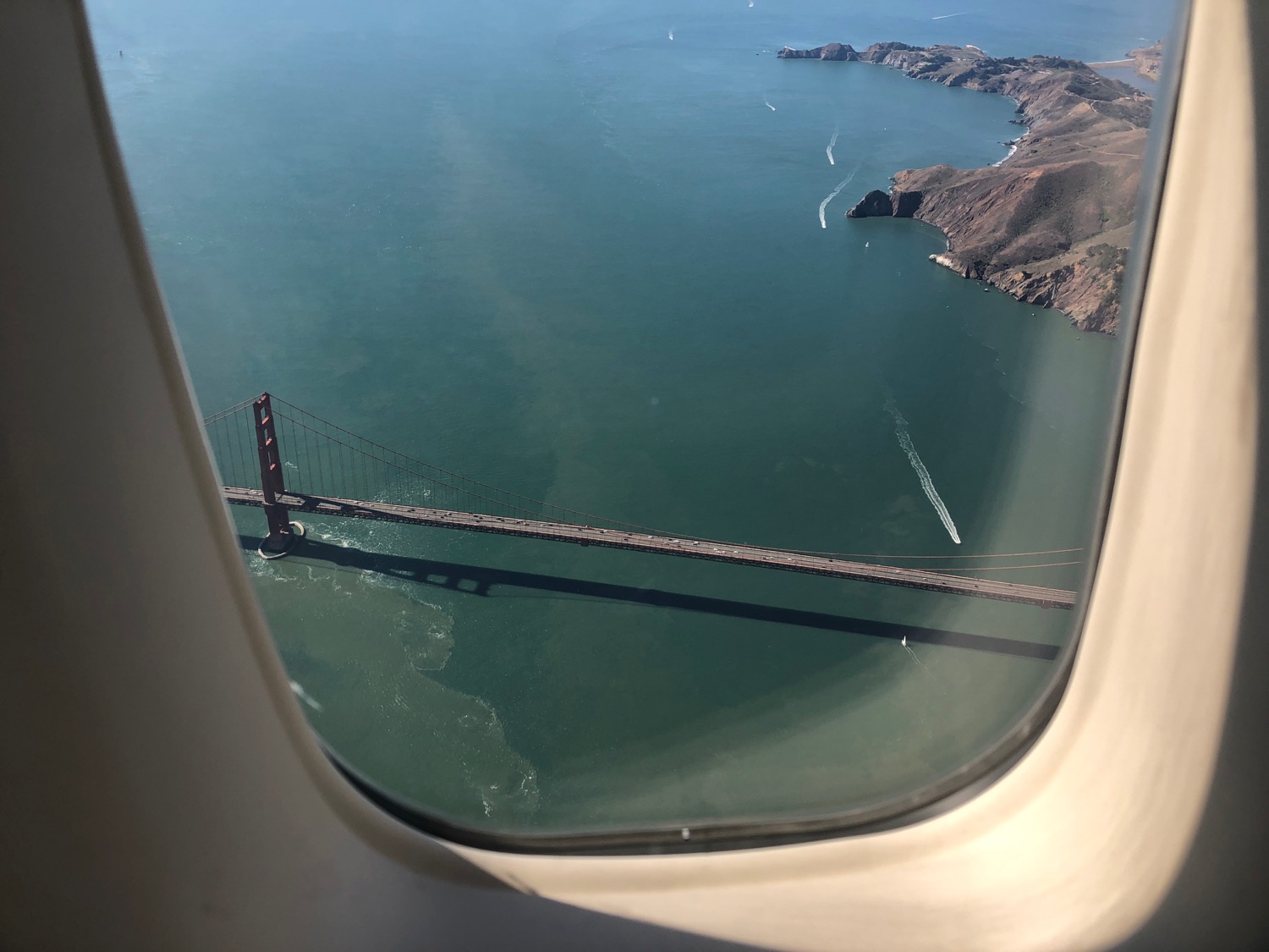 a view of a bridge from an airplane window