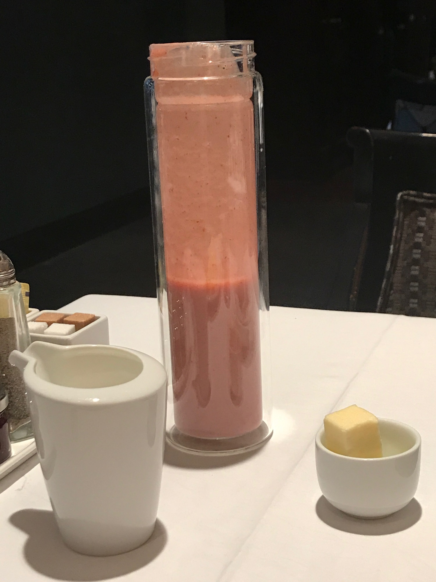 a pink liquid in a glass container