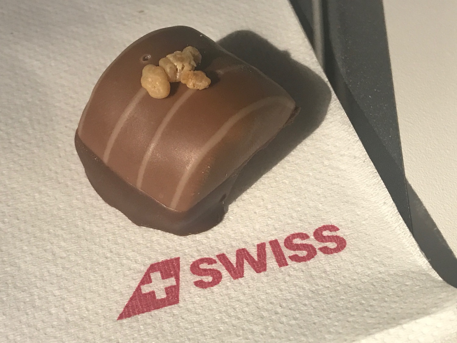 a chocolate candy on a napkin