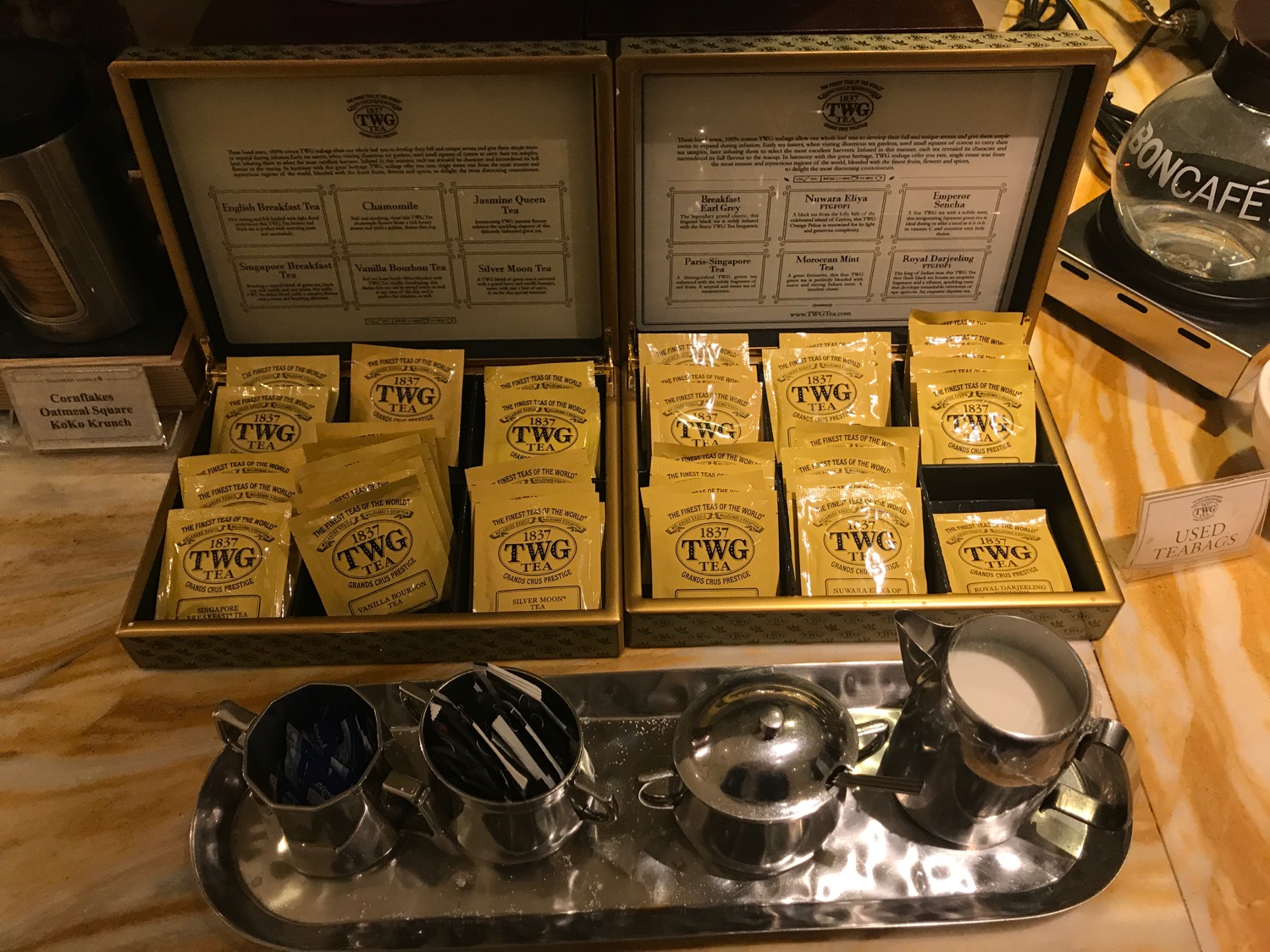 a box with a tray of tea and condiments