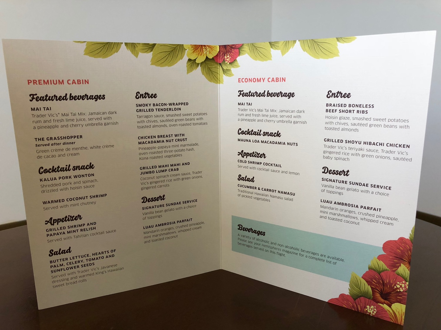 a menu with flowers on the side