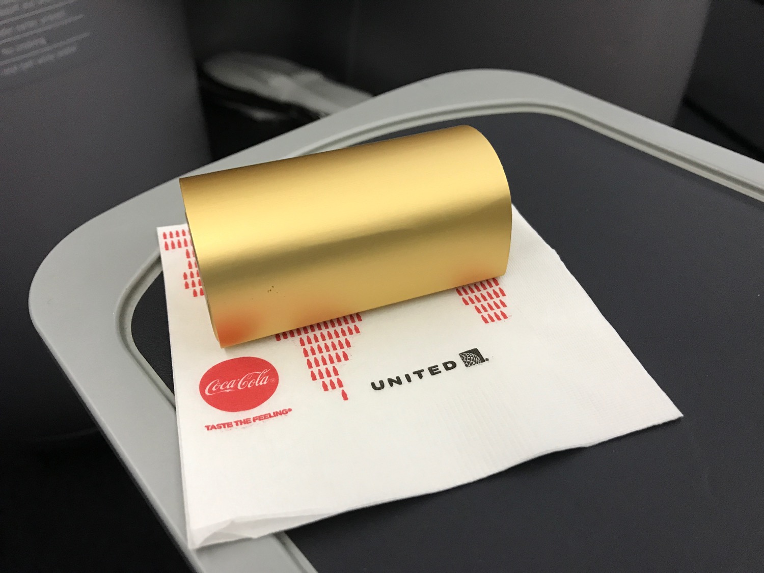 a gold roll on a napkin