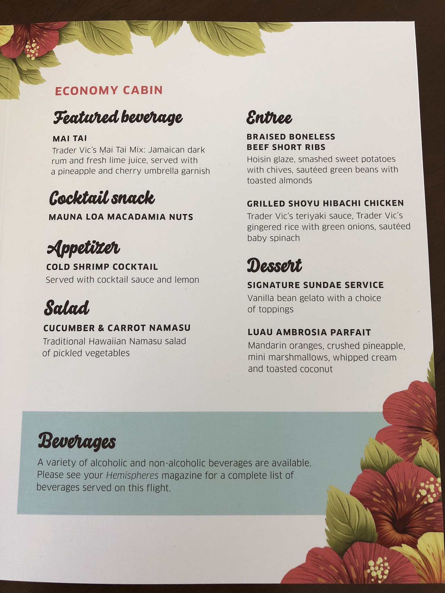 a menu with flowers on it