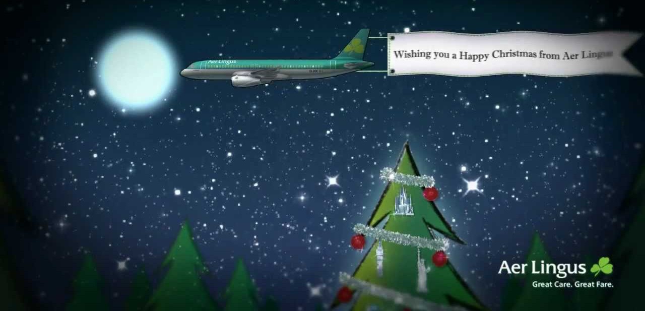 a plane flying over a christmas tree