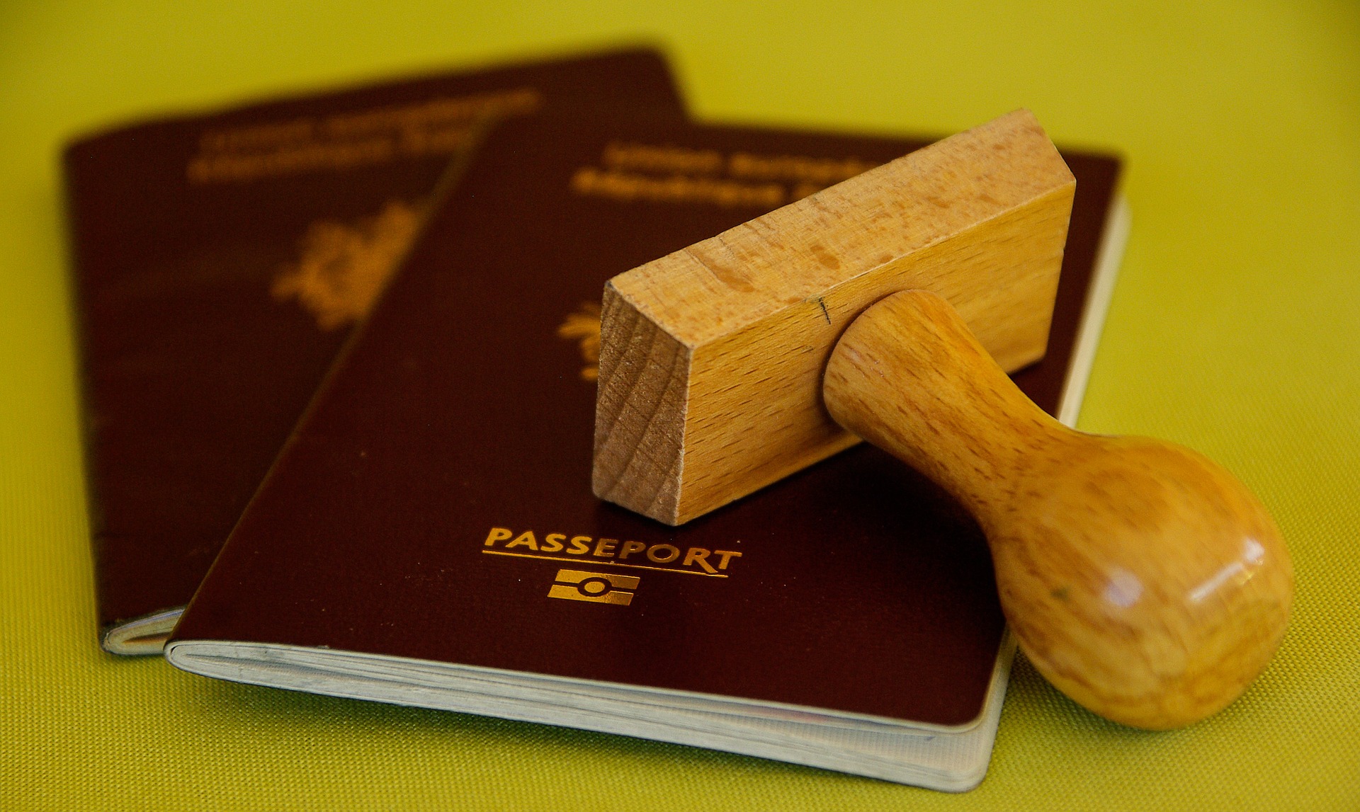 a wooden stamp on a passport