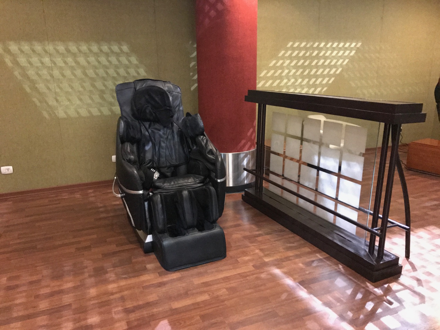 a black massage chair in a room